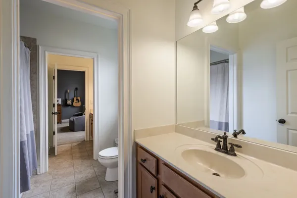 a view of game room with gym equipment