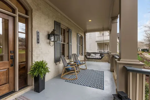 a view of a chairs and table on the wooden floor