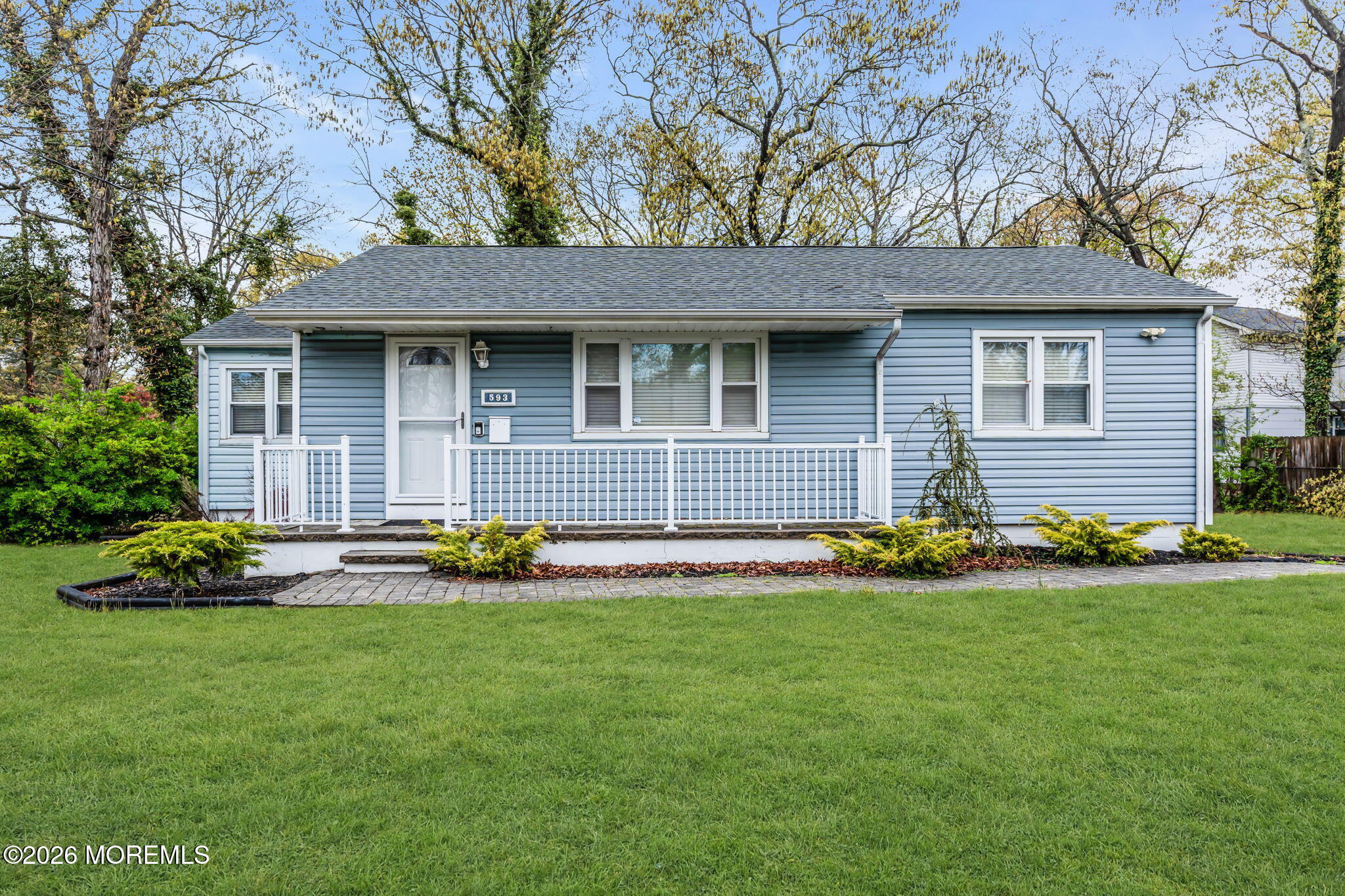 593 Beach Plum Road Brick, NJ 08723 - Photo 4 of 38 a front view of a house with a garden and yard