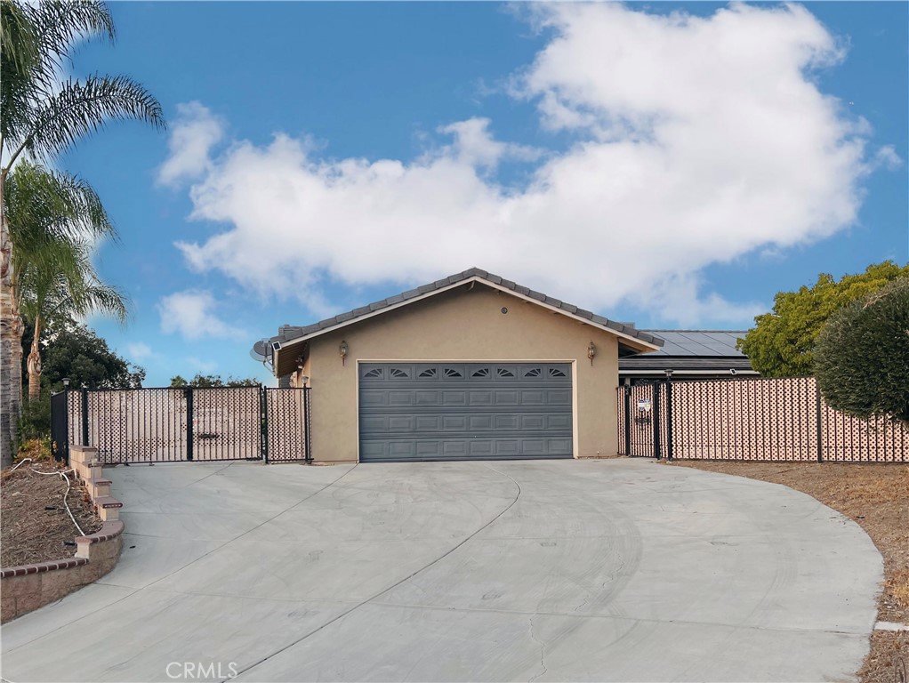 a view of backyard of a house