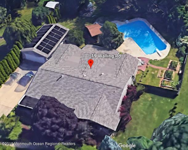 19 Walling Road Freehold, NJ 07728 - Photo 54 of 55 a view of a backyard