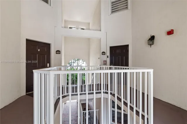 a view of a porch with wooden floor