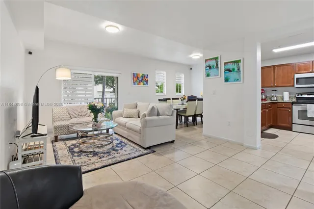 a living room with furniture and a table