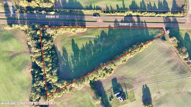 a view of a lake with a garden