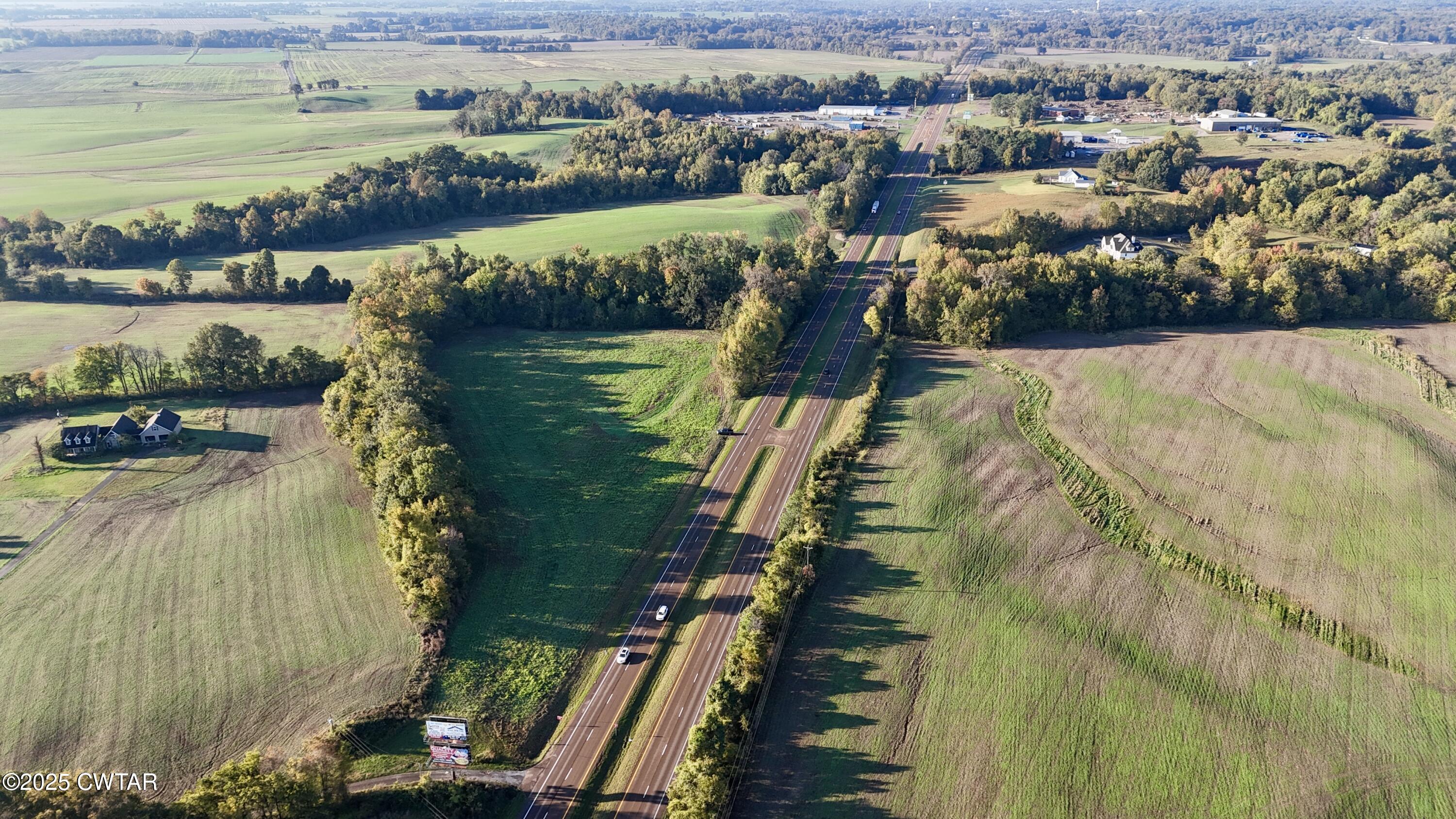 0 Reese Alexander Road Union City, TN 38261 - Photo 6 of 6 a view of a lake with a yard