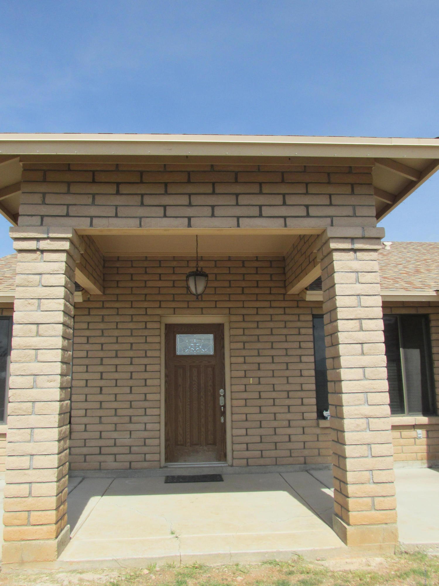 219 Paseo Mascota Rio Rico, AZ 85648 - Photo 7 of 7 a view of a brick wall