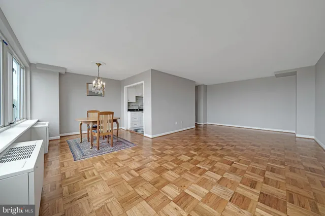 a view of a livingroom with a dinning table and chair
