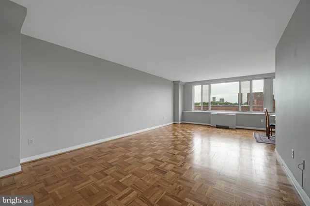 a view of an empty room and window