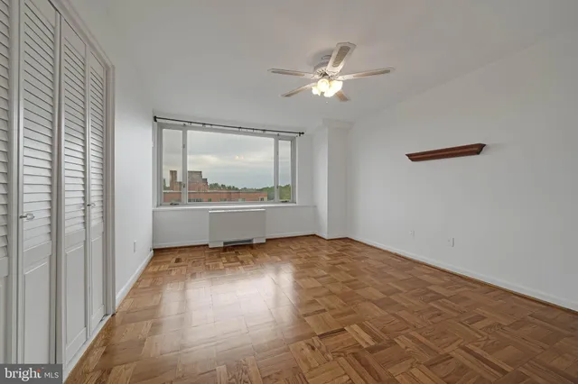 a view of an empty room and window
