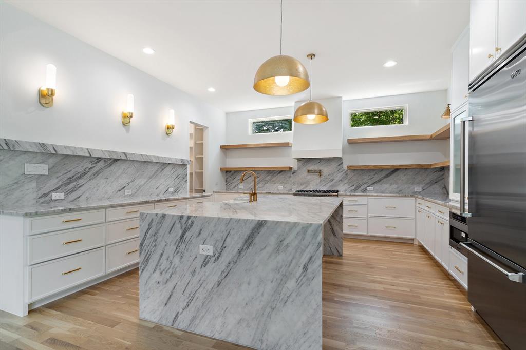 3253 Jubilee Trail Dallas, TX 75229 - Photo 9 of 31 Natural stone countertops.