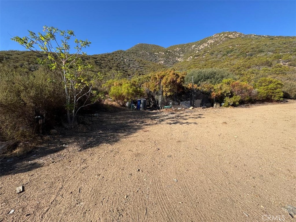 45740 Chapman Road Anza, CA 92539 - Photo 12 of 15 a view of a dry yard with mountains in the background