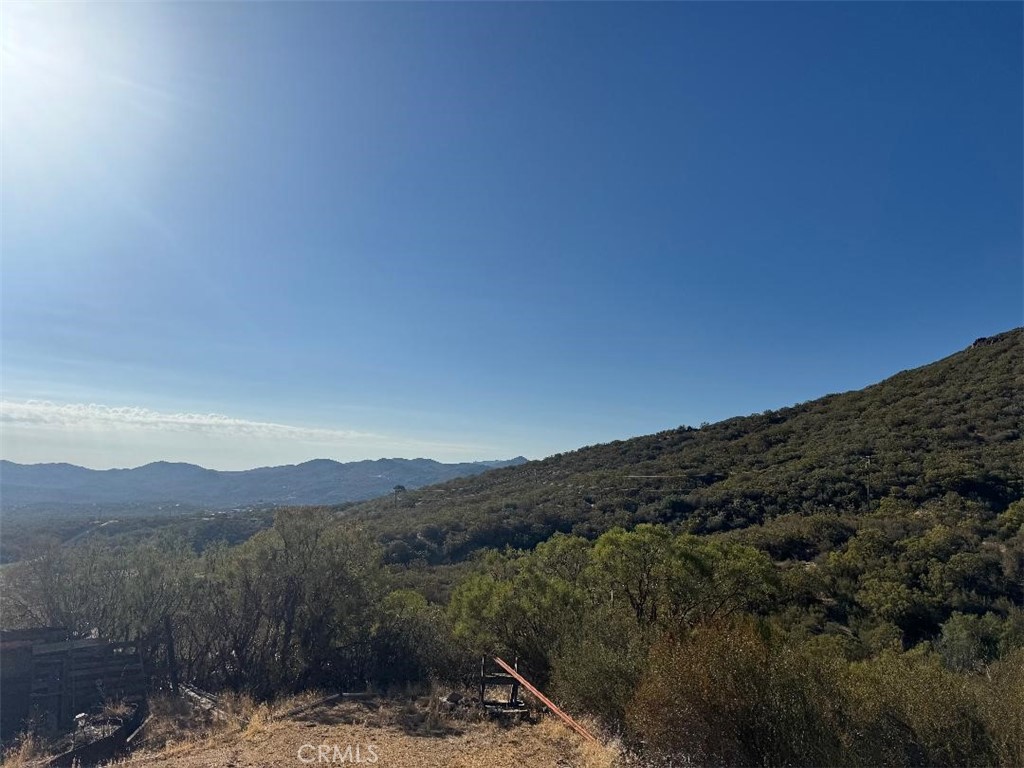 45740 Chapman Road Anza, CA 92539 - Photo 4 of 15 a view of a mountain range in a cloudy sky