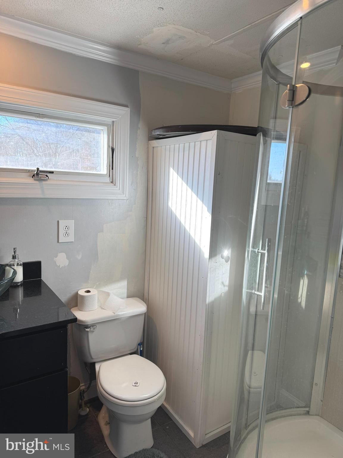 1800 Bel Air Road, Unit 66 Woodbridge, VA 22191 - Photo 15 of 18 a white toilet sitting next to a bathroom sink