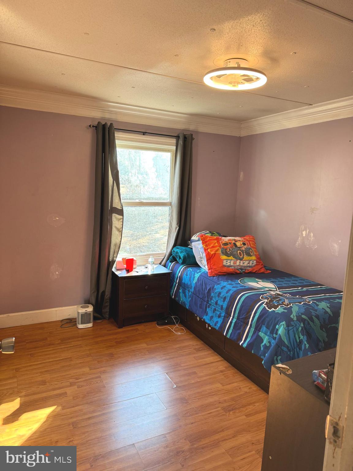 1800 Bel Air Road, Unit 66 Woodbridge, VA 22191 - Photo 16 of 18 a bedroom with a bed and window