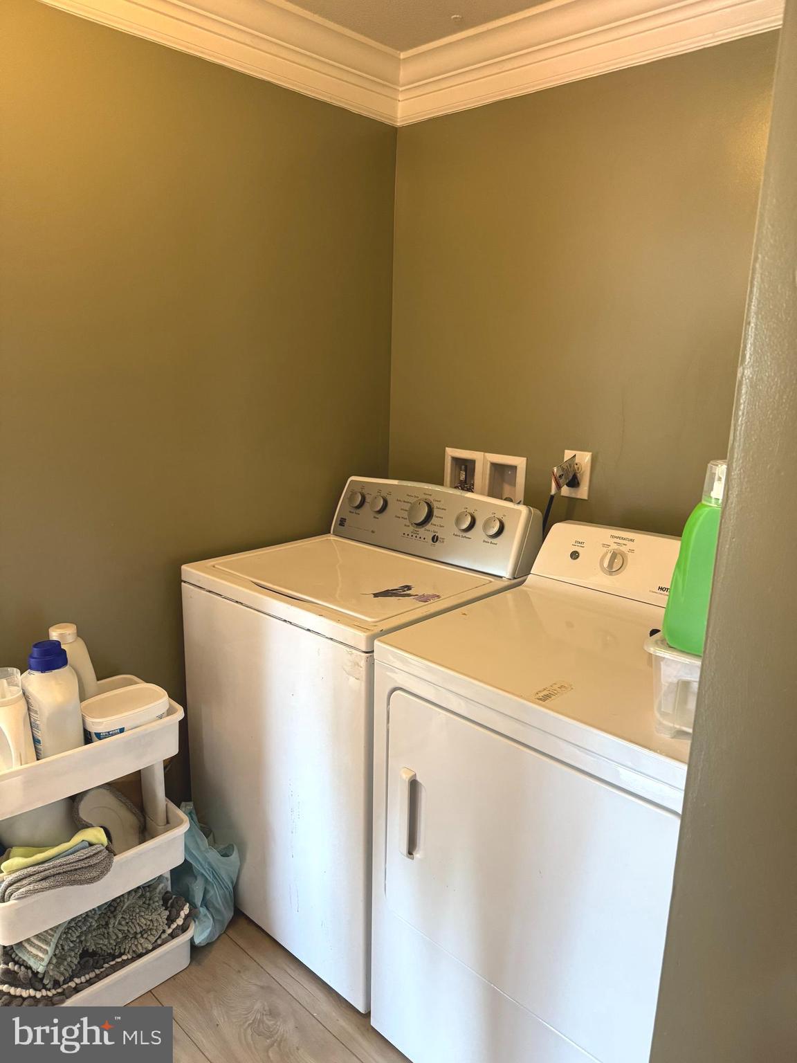 1800 Bel Air Road, Unit 66 Woodbridge, VA 22191 - Photo 18 of 18 a utility room with dryer and washer