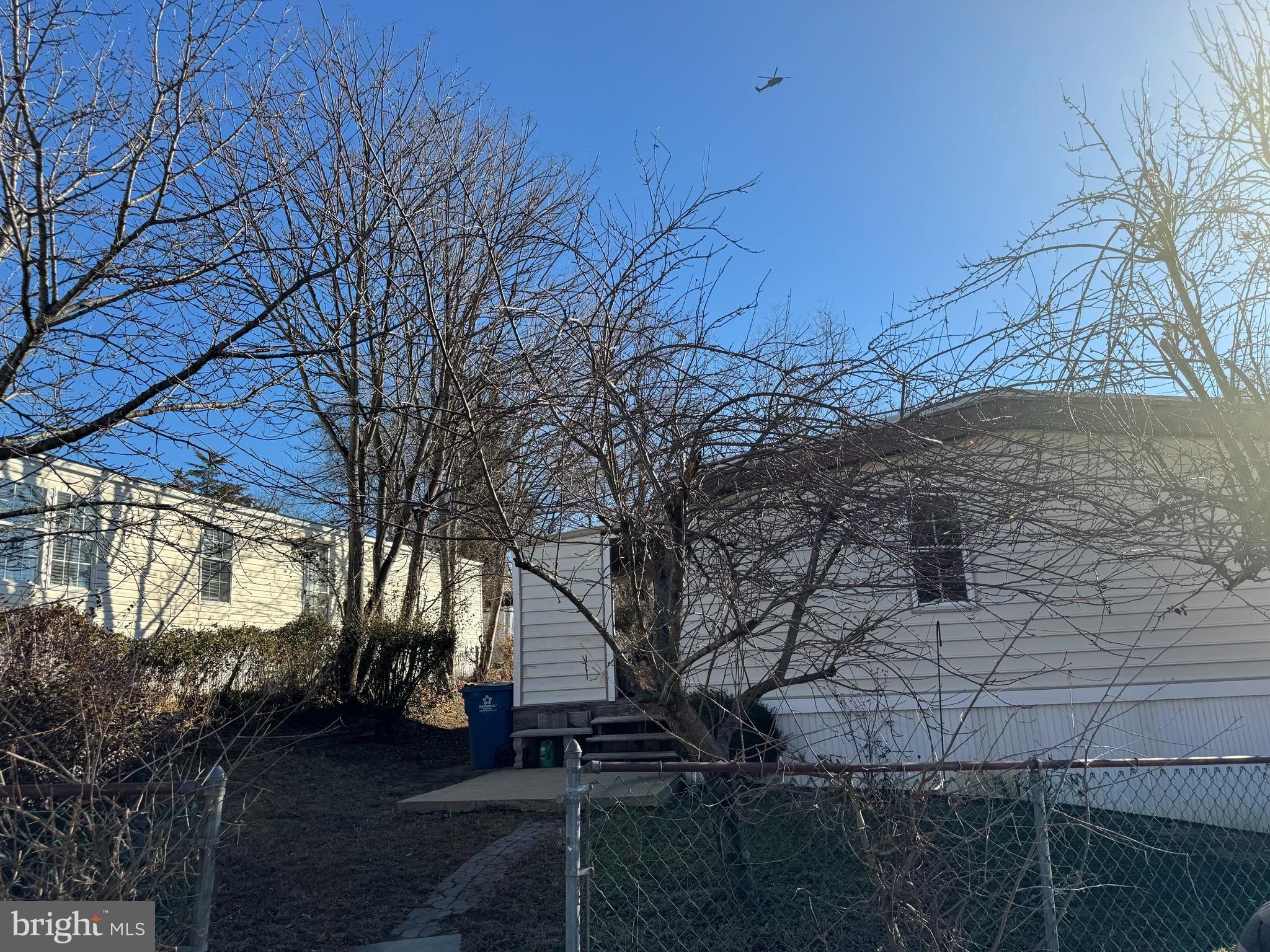 1800 Bel Air Road, Unit 66 Woodbridge, VA 22191 - Photo 2 of 18 a backyard of a house with lots of green space