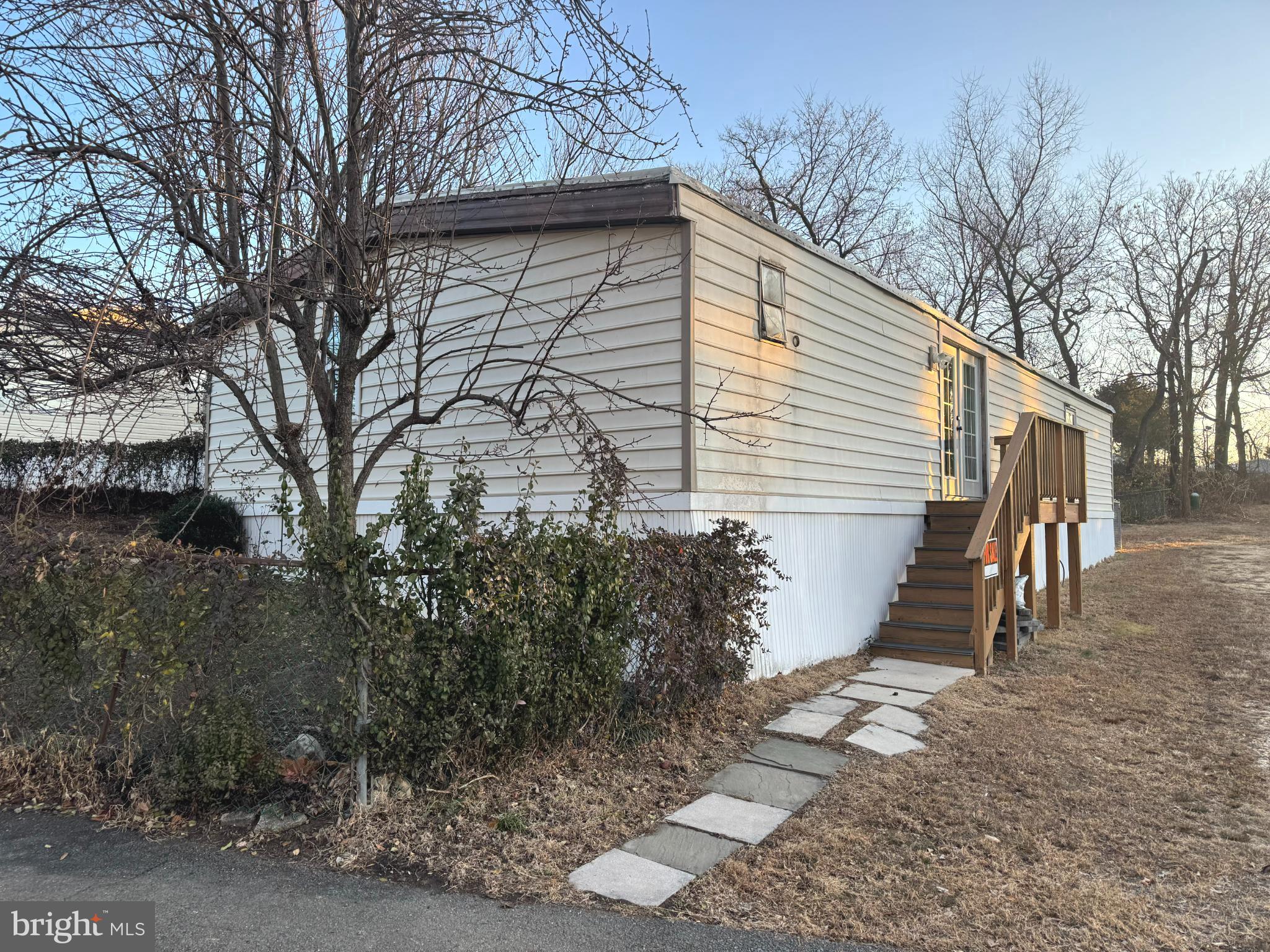 1800 Bel Air Road, Unit 66 Woodbridge, VA 22191 - Photo 3 of 18 a view of a house with a yard