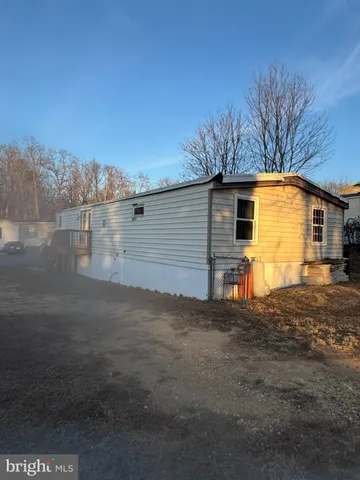 a view of a backyard of the house