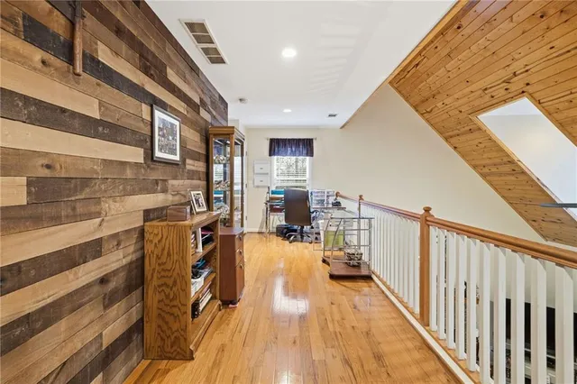 a bed room with furniture and window