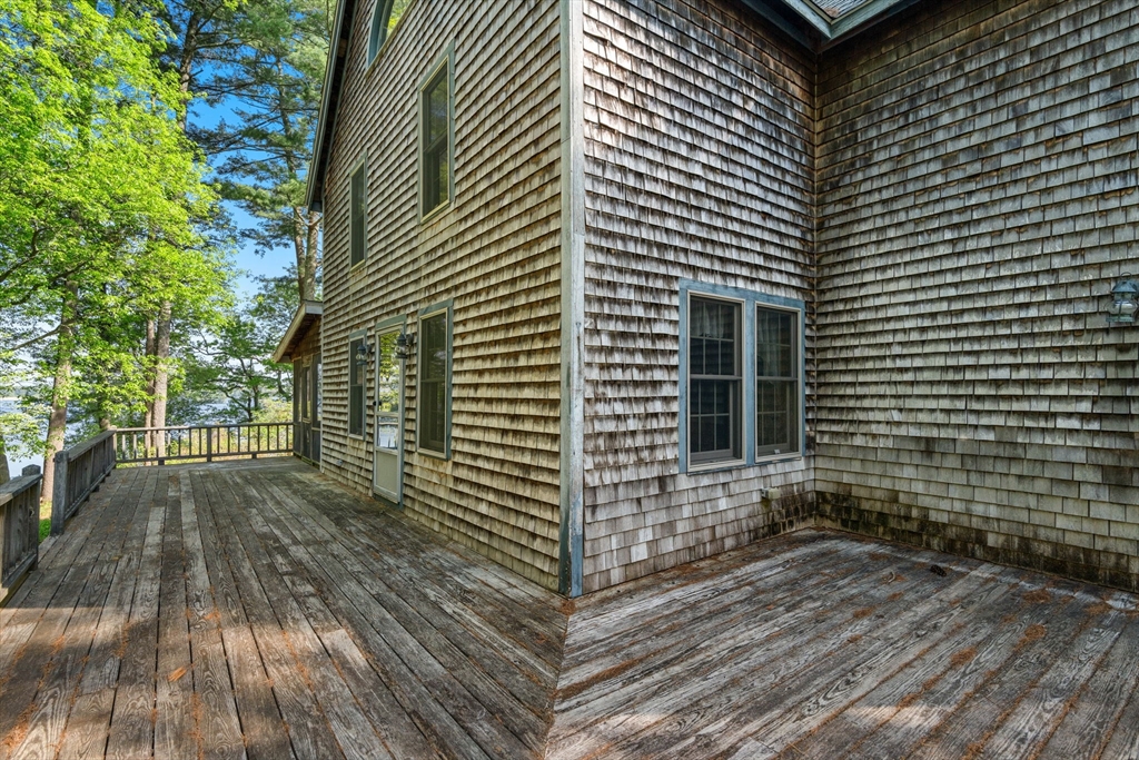 362 Snows Pond Road Rochester, MA 02770 - Photo 28 of 41 a view of a house with a yard