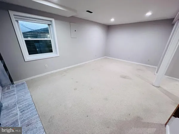 en empty room with windows
