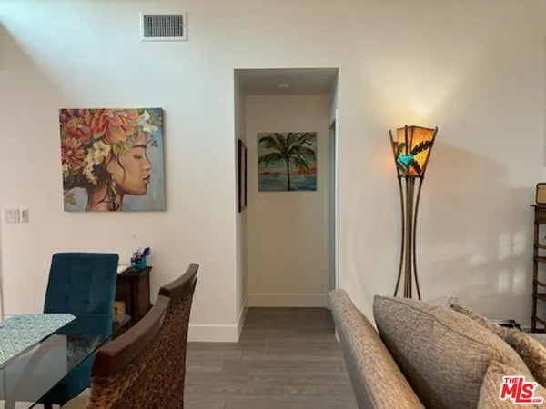 a view of a livingroom with furniture and a couch