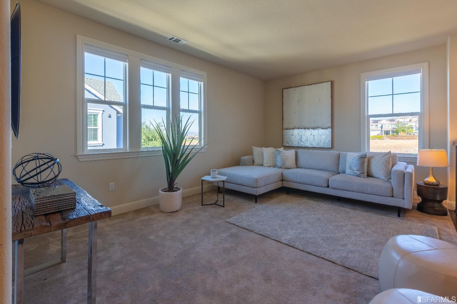 4456 Sunset View Drive Dublin, CA 94568 - Photo 16 of 40 a living room with furniture and a window