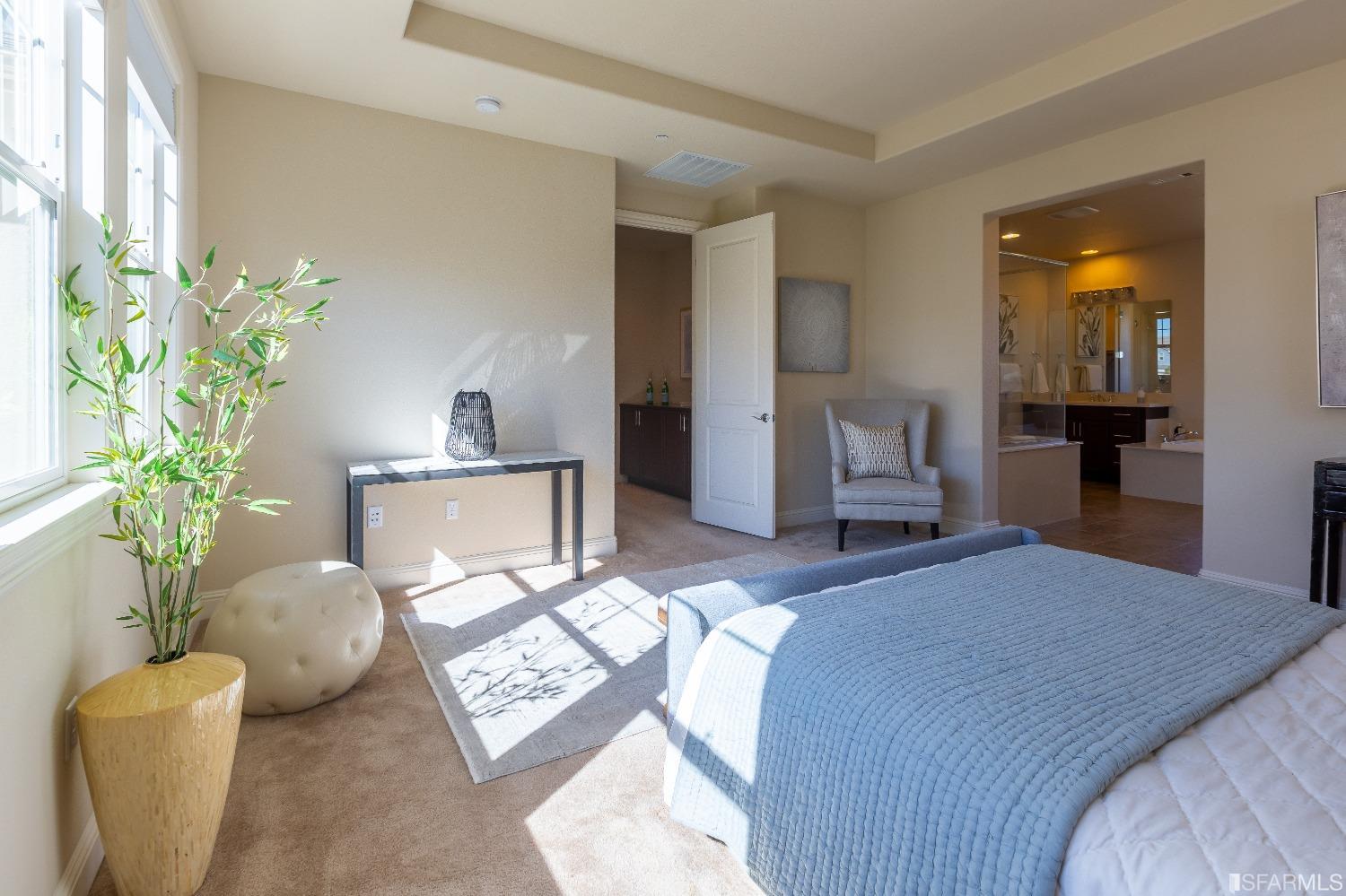 4456 Sunset View Drive Dublin, CA 94568 - Photo 21 of 40 a bedroom with a bed and a potted plant