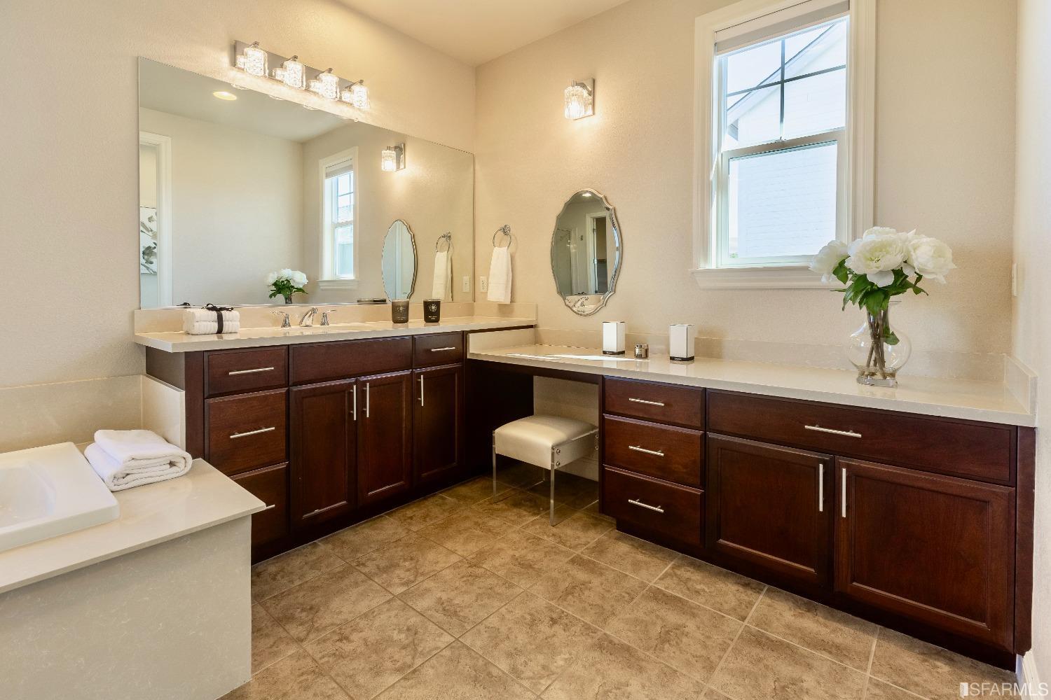 4456 Sunset View Drive Dublin, CA 94568 - Photo 23 of 40 a spacious bathroom with a sink double vanity and a mirror