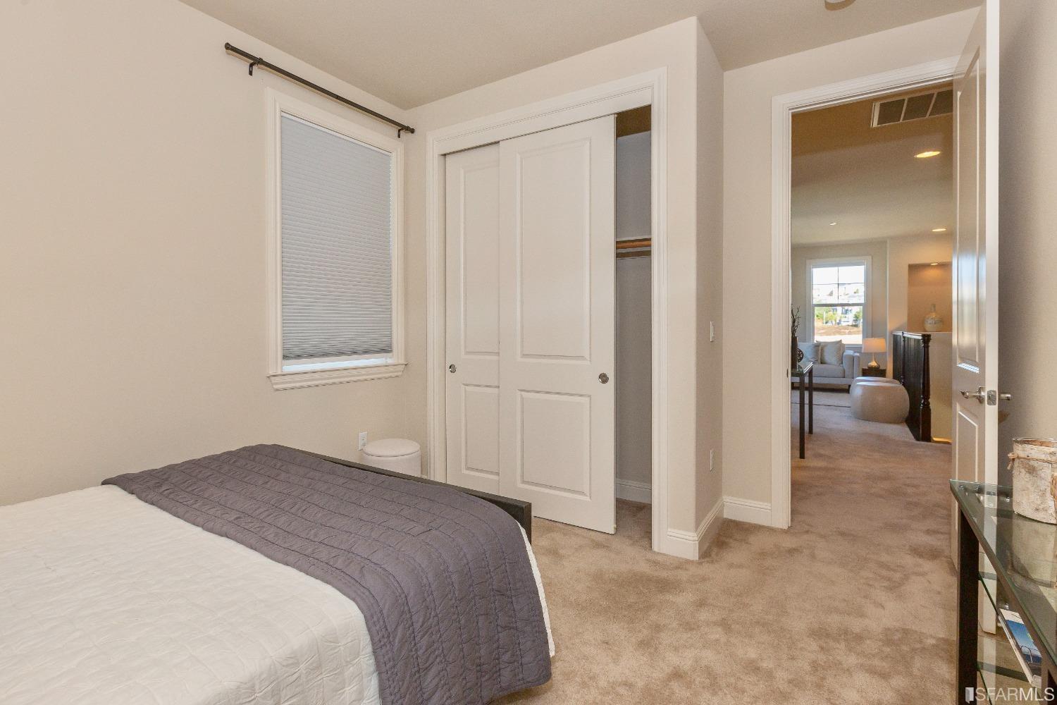 4456 Sunset View Drive Dublin, CA 94568 - Photo 31 of 40 a bedroom with a bed and a mirror