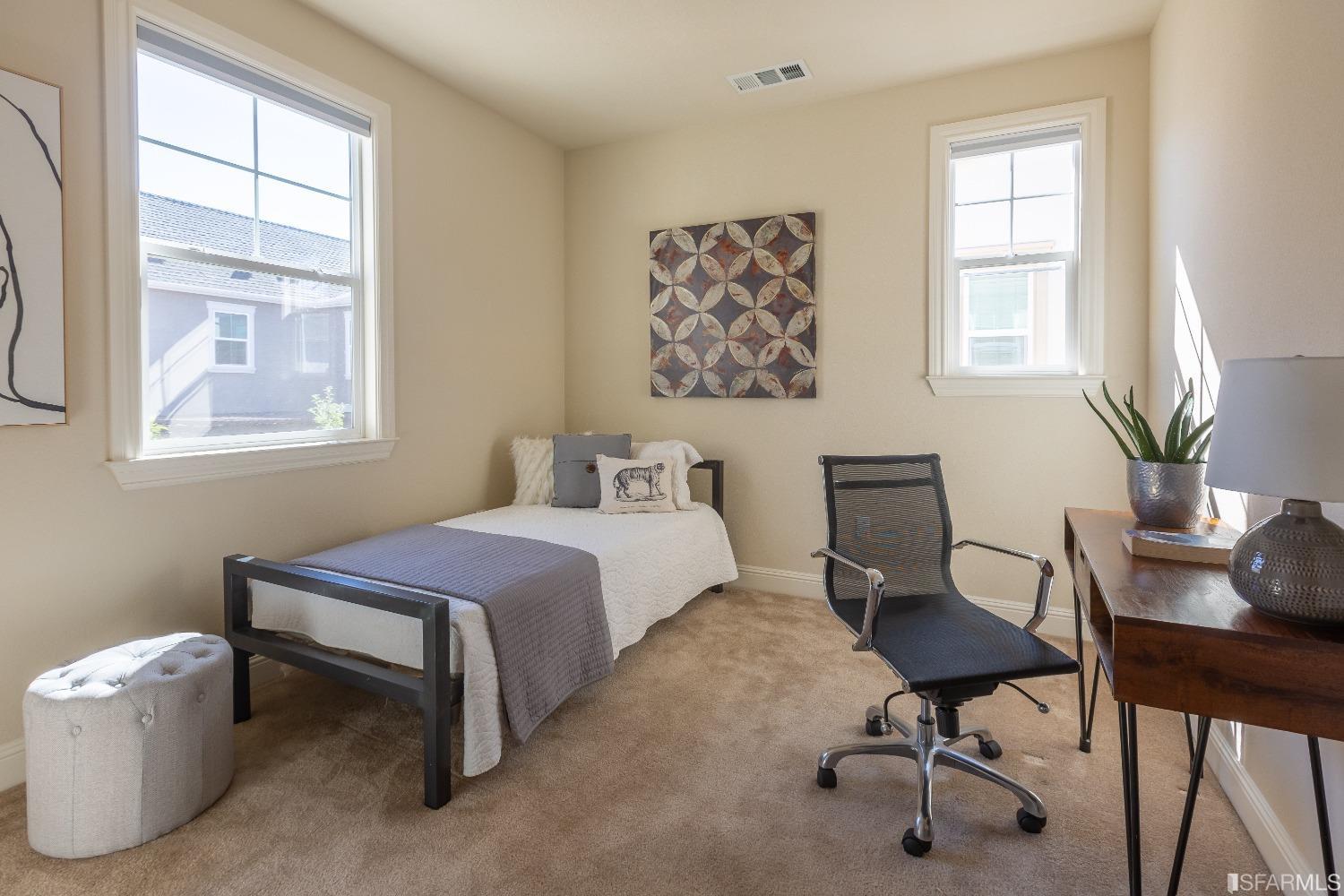 4456 Sunset View Drive Dublin, CA 94568 - Photo 32 of 40 a bedroom with a bed and a window