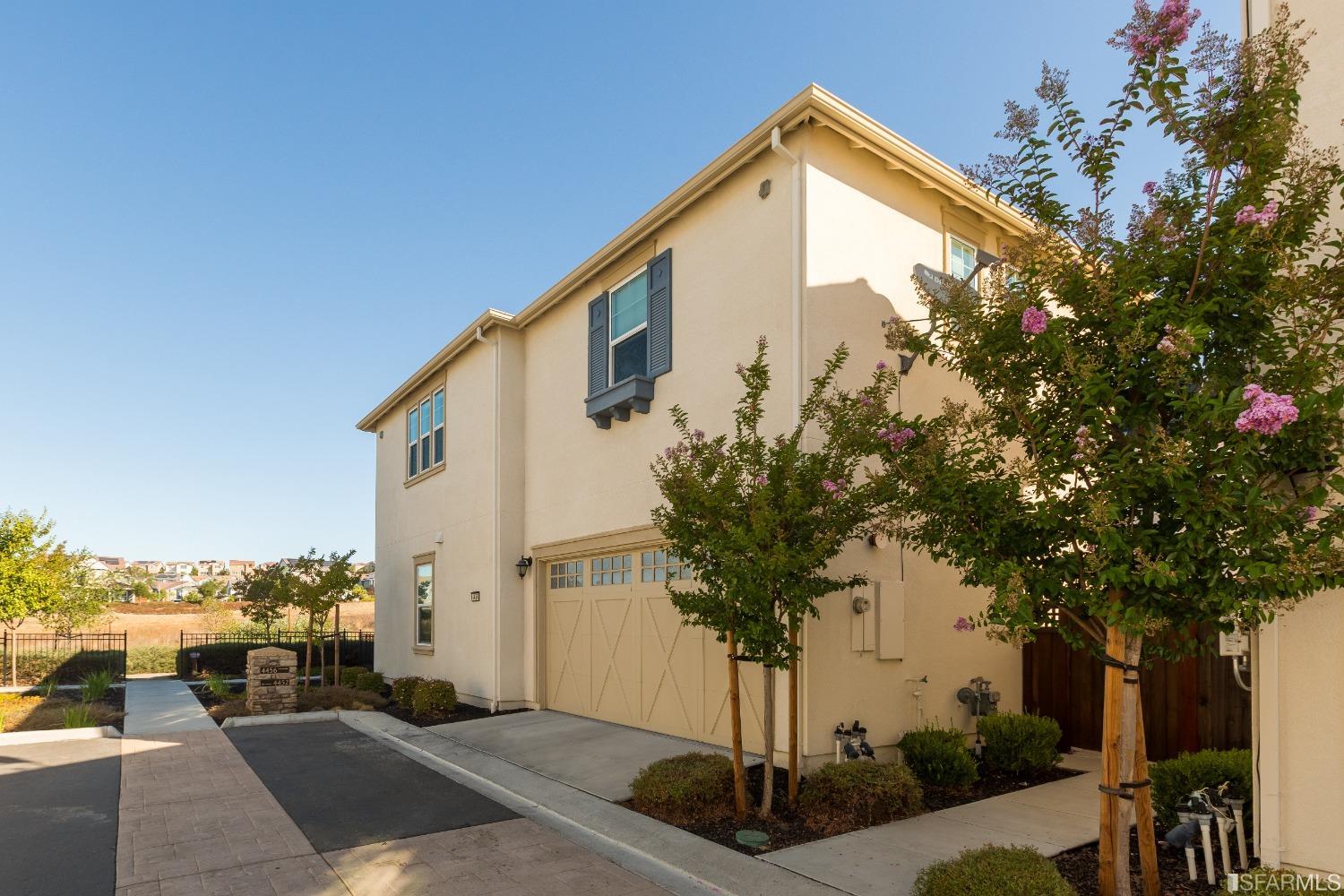 4456 Sunset View Drive Dublin, CA 94568 - Photo 38 of 40 a front view of a house with a yard and mountain view