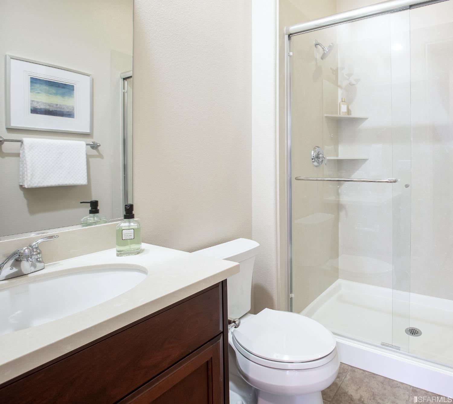 4456 Sunset View Drive Dublin, CA 94568 - Photo 9 of 40 a bathroom with a sink a toilet and shower