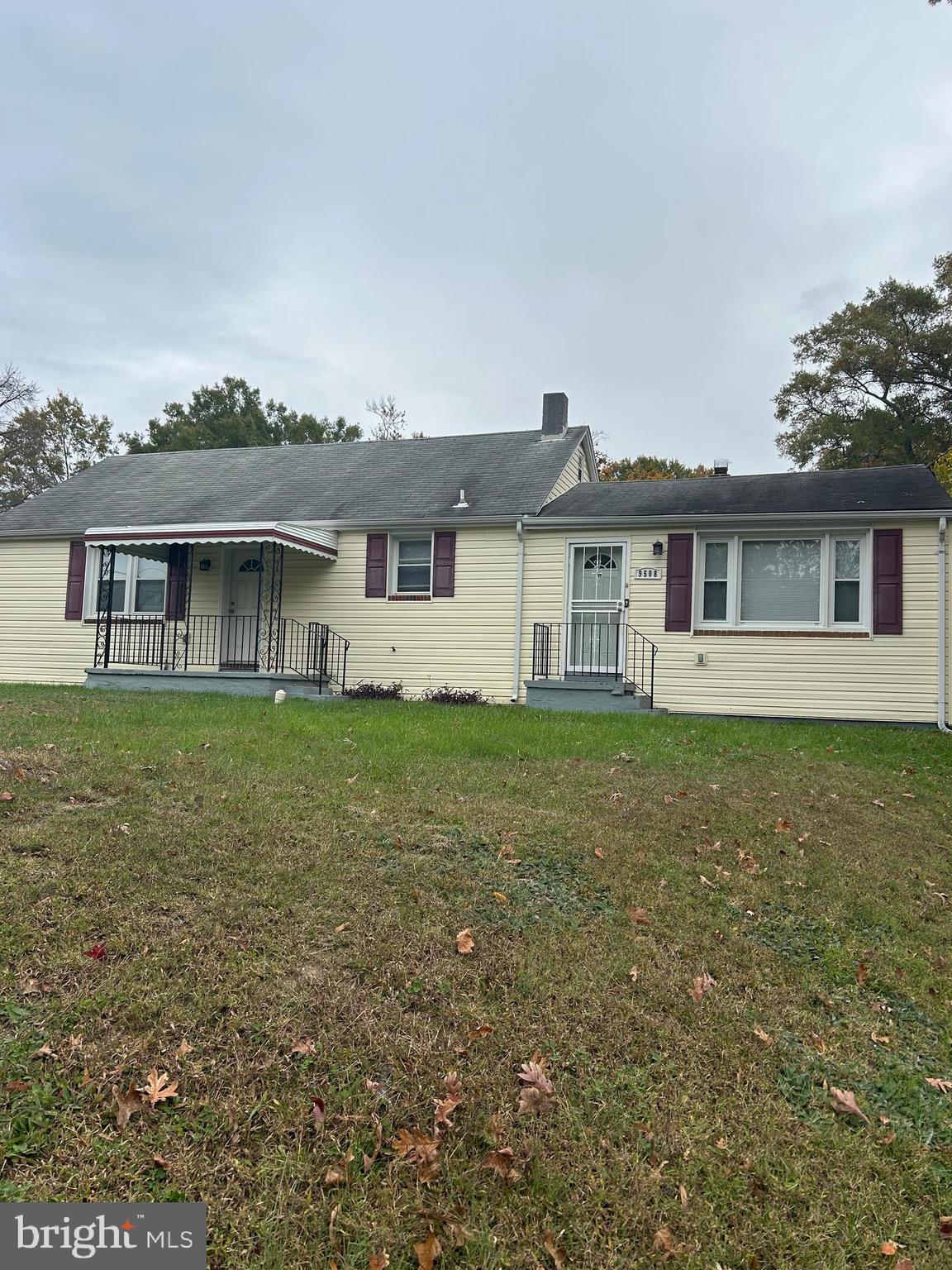 9508 Temple Hill Road Clinton, MD 20735 - Photo 1 of 1 a front view of a house with a garden