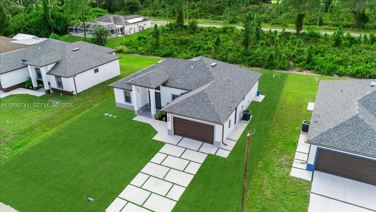 766 Roma Avenue South Lehigh Acres, FL 33974 - Photo 4 of 57