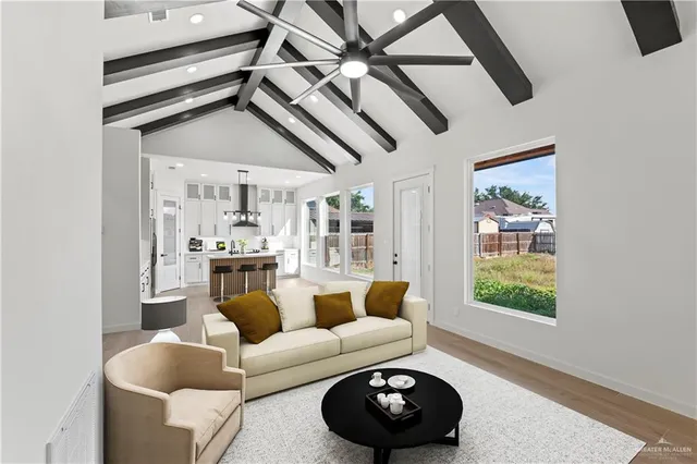 a living room with furniture and a painting