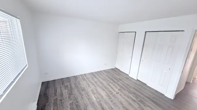 a view of a house with a yard from a balcony