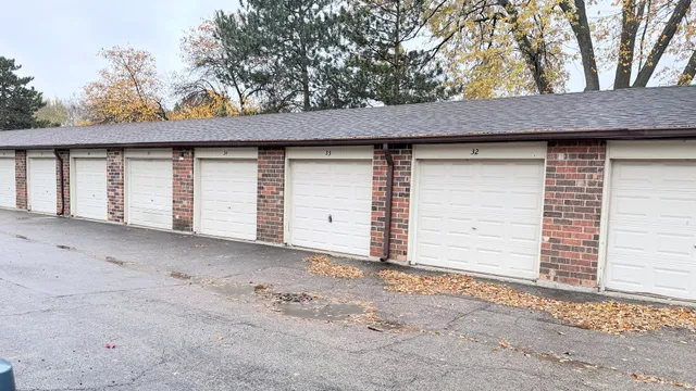 a balcony with wooden floor and furniture
