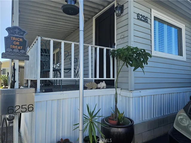 a view of a balcony with plants