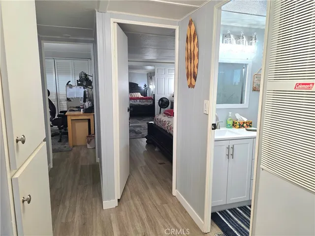 a bedroom with bed and a window