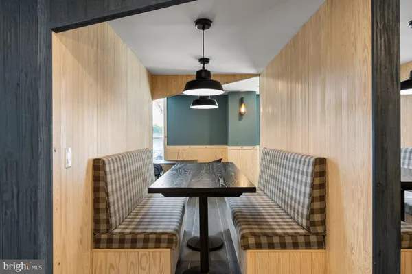 a room with furniture and wooden floor