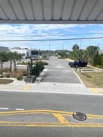 a view of a swimming pool and an outdoor space