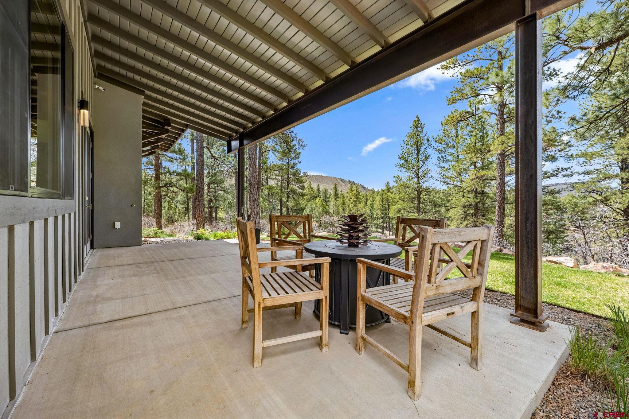201 Window Lake Trail Durango, CO 81301 - Photo 37 of 45 a view of an outdoor dining space with furniture and garden view