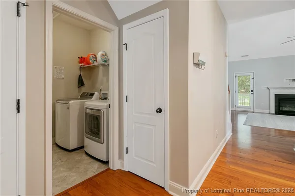 a view of living room with furniture and flat screen tv