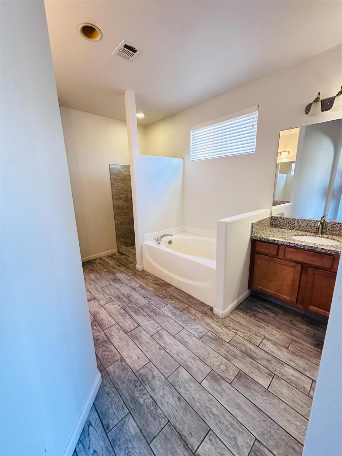 6642 East Cetti Avenue Fresno, CA 93727 - Photo 11 of 18 a view of kitchen and utility room