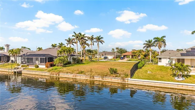 a view of an ocean with residential houses