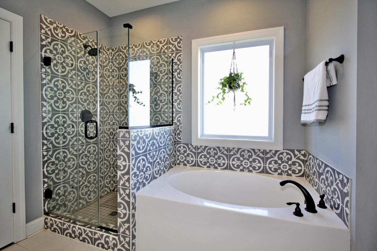 1044 Luton Way White House, TN 37188 - Photo 14 of 26 a bathroom with a bathtub and shower