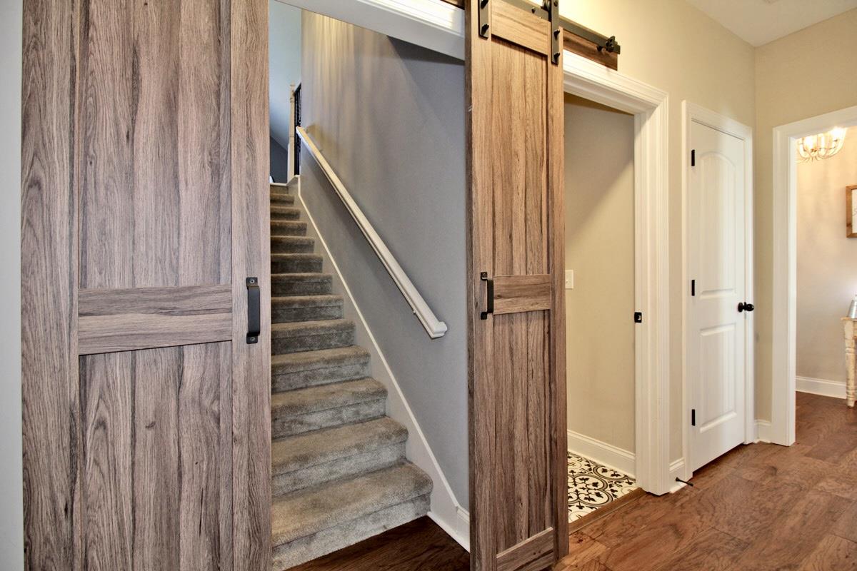1044 Luton Way White House, TN 37188 - Photo 16 of 26 a view of a hallway with wooden floor and entryway