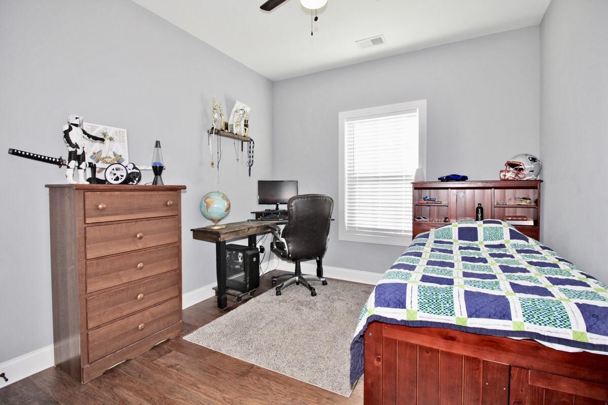 1044 Luton Way White House, TN 37188 - Photo 20 of 26 a bedroom with a bed and furniture
