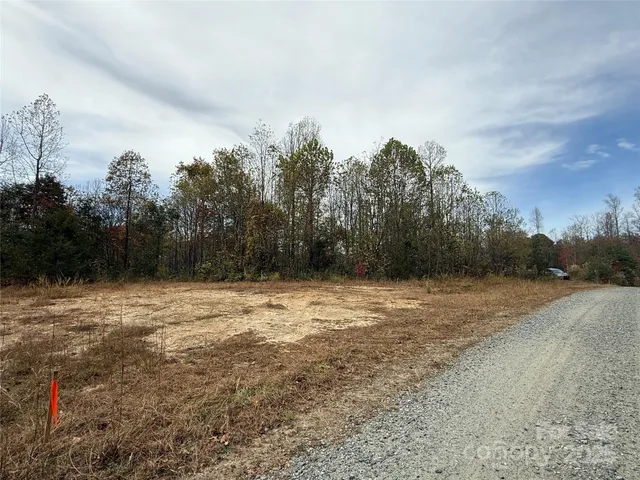 a view of swimming pool with an outdoor space and seating area